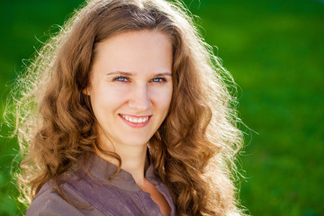 Portrait of beautiful young happy woman