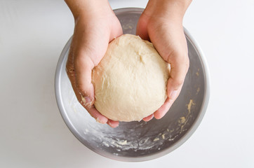 Bread dough in hand for baking,Homemade bakery