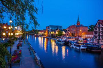 Old Town and granaries by the Brda River at night. Bydgoszcz. Poland - obrazy, fototapety, plakaty