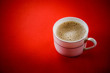 Tea with in a mug or popularly known as Teh Tarik isolated in white view from top.