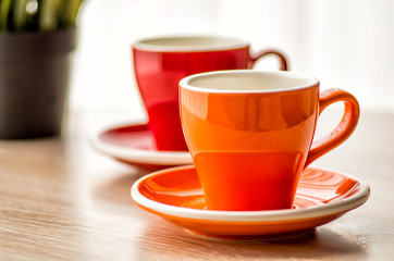 still life colorful tea cups on the wooden table