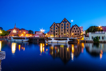 Old Town and granaries by the Brda River at night. Bydgoszcz. Poland