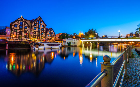 Old Town and granaries by the Brda River at night. Bydgoszcz. Poland
