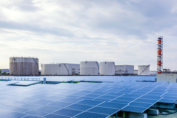 industrial buildings and solar panels. renewable energy concept.
