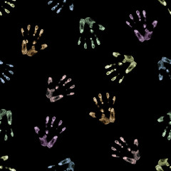 seamless hand drawn pattern of palm imprints drawn in color chalk isolated on black background
