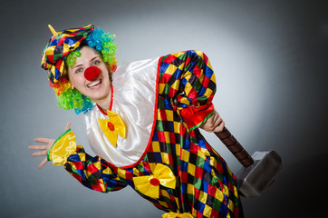 Funny clown in comical concept