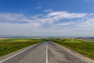 road fields hills asphalt