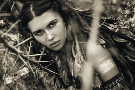 wild amazon woman portrait with tree thorns