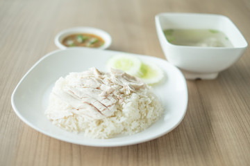 Asian well known food a Hainanese Chicken Rice or Asian gourmet steamed chicken with rice