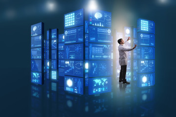 Doctor in telemedicine concept pressing buttons