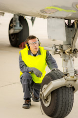 Fototapeta na wymiar airport worker mechanic