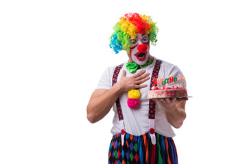 Funny clown with a birthday cake isolated on white background