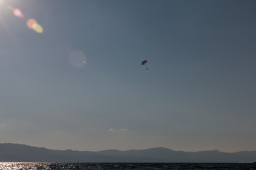 Parasailing on the Lake in Bright Sunlight