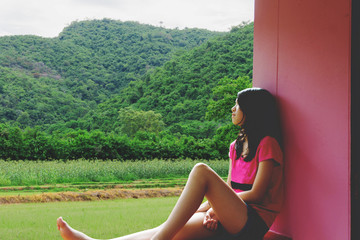 depress and hopeless girl sitting outdoor (abuse concept)