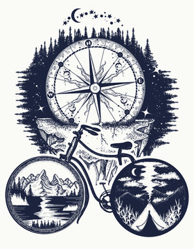 Bicycle and mountains tattoo art. Symbol of travel, tourism, adventure. Compass and mountains in bicycle wheels t-shirt design