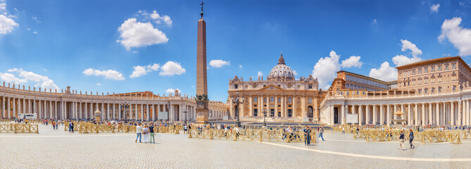 St. Peter's Square and St. Peter's Basilica, Vatican City in the day time, tourist around. Italy. - obrazy, fototapety, plakaty