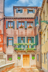 View of the most beautiful places of Venice, narrow streets, houses, city squares. Italy.