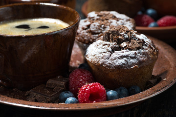 chocolate muffins and a cup of coffee, horizontal