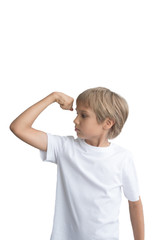 Boy showing his hand biceps muscles strength, isolated on white background.