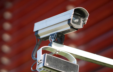 Closed-circuit television, surveillance camera on building exterior