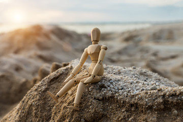 wooden models feel lonely at sunset.