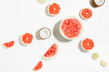 Slices of watermelon, coconut, melon, grapefruit, lime and lemon