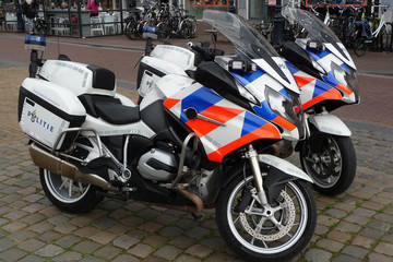 Obraz na płótnie Canvas Dutch Flag Motif Police Motorcycles
