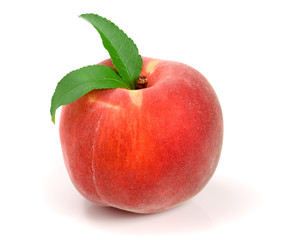 Peach with leaf isolated on white background