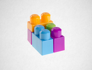 Building blocks or Plastic building blocks on background.