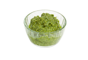 Pesto in the small glass bowl