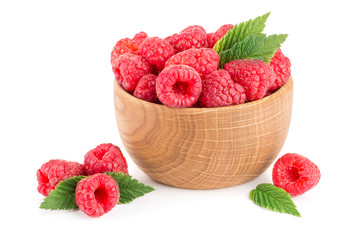 Raspberry in a wooden bowl isolated on a white background