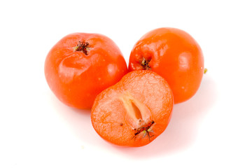 Orange rowan isolated on white background macro