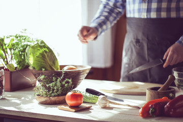 male cooking healthy salad