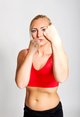 Beautiful young woman boxing