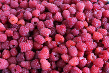 Fresh raspberries as background