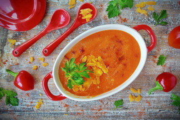 cream soup of roasted peppers with parsley and red cheese
