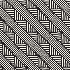 Hand drawn style ethnic seamless pattern. Abstract geometric tiling background in black and white.