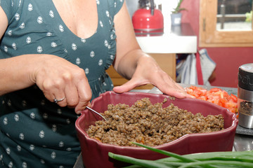 hands woman preparing meal for dinner