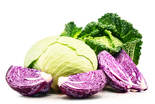 Fresh organic cabbage heads isolated on white