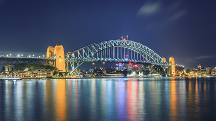 Naklejka premium The Iconic Harbour Bridge at night from Circular Quay. Sydney Harbour Bridge is considered as the major landmark of Sydney and tourists attraction.