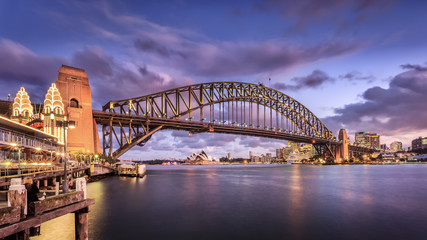 The Iconic Harbour Bridge at twilight from Circular Quay. Sydney Harbour Bridge is considered as...