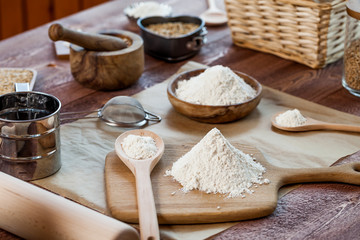 wheat and flour on rustic wooden table