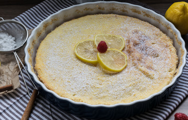 Homemade cheesecake with raspberries and lemon. Delicate dessert for coffee