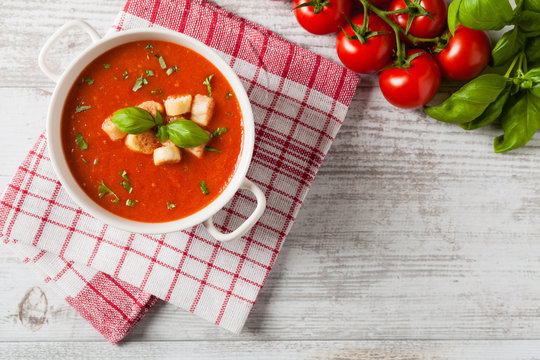 Traditional tomato soup, served with croutons.