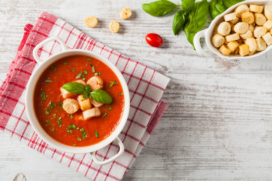 Traditional tomato soup, served with croutons.