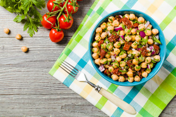 Chickpeas salad with onion and dried tomatoes.