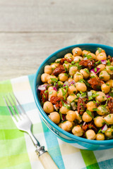 Chickpeas salad with onion and dried tomatoes.