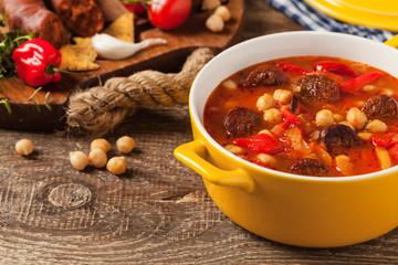 Traditional chickpea soup with paprika and chorizo sausage.
