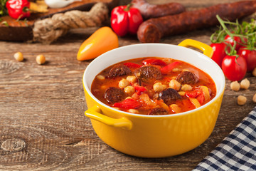 Traditional chickpea soup with paprika and chorizo sausage.