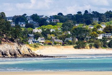 Beautiful village of Morgat with the sand beach and rocky coastline, Finistere, Brittany (Bretagne), France.